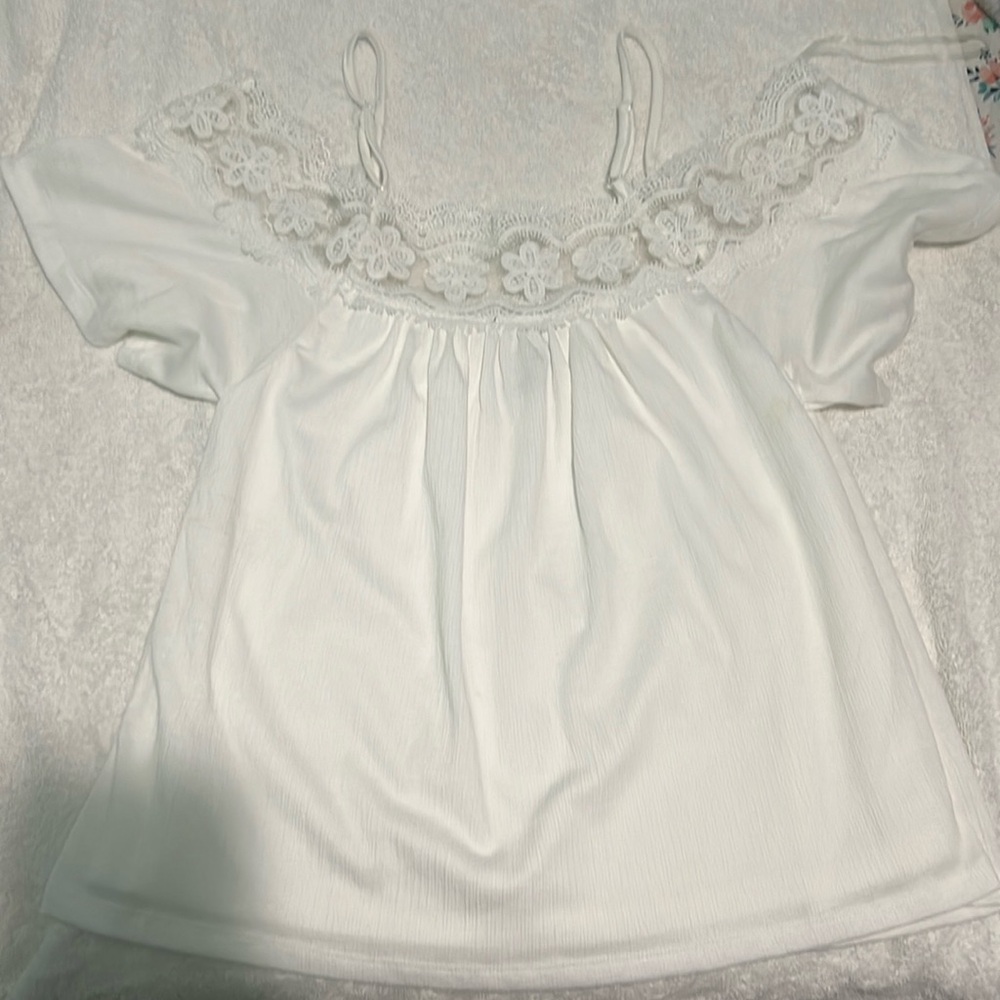 I am selling a white day trip off the shoulder shirt.
